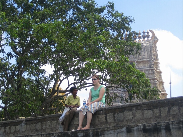 A postcard seller wishes Tracy a happy birthday on Chamundi Hill, Mysore